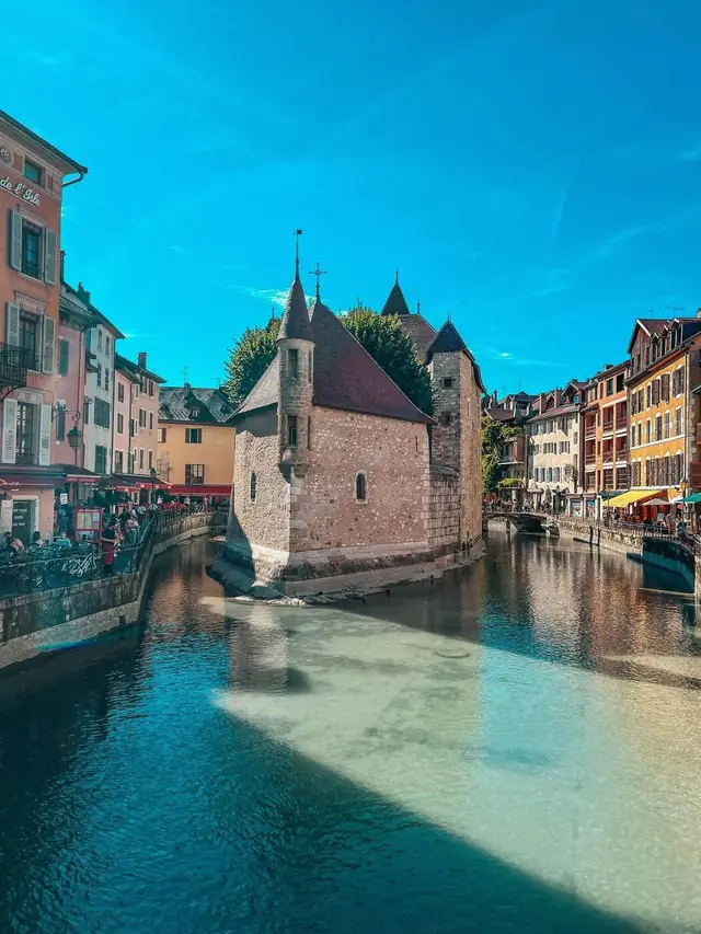 The Palais de l’Isle on the canals of Annecy old town in summer